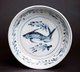 Vietnam: Blue and White Fish Plate with single fish swimming among water plants, set within a band of scrolling lotus. Later Lê Dynasty (1533-1788)